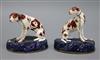 A pair of 19th century English porcelain models of setters tallest 12cm                                                                