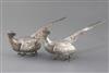 A modern matched pair of silver free-standing model pheasants, gross 20 oz.                                                            