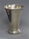 An early 20th century Swedish white metal beaker with flared rim, 11.3cm.                                                              