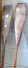 A pair of vintage wooden oars                                                                                                                                                                                               