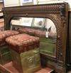 A late 19th century carved oak overmantel W.136cm                                                                                      