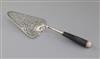 An early George III pierced silver fish slice, 32cm.                                                                                   