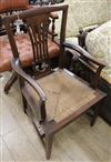 A 19th century Chippendale style elbow chair                                                                                           