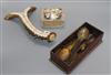 A stag antler cribbage board, a shell encrusted box and a collection of horn spoons cribbage board length 8cm                          