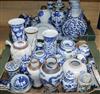 A large collection of 19th century Chinese blue and white vases, bowls, etc. and two famille rose pots                                 