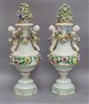 A pair of Dresden, Meissen style floral encrusted lidded vases, height 44cm (a.f.)                                                     