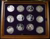 QE II Golden Jubilee Collection - 19 sterling silver proof five dollars, five pounds etc. each 28.28g. and two similar coins           