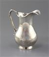 A modern silver cream jug by Rodney C. Pettit, 10 oz.                                                                                  