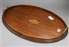 An Edwardian inlaid oval tea tray length 60cm                                                                                          