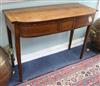 A George III mahogany and marquetry bow fronted two drawer serving table W.117cm                                                       