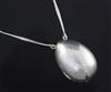 An Astrid Fog for Georg Jensen sterling silver egg shaped pendant necklace, no. 122, pendant 52mm.                                     