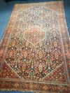 An Isphaphan red and blue ground medallion rug 205 x 132cm                                                                             