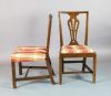 A set of ten George III country Chippendale mahogany dining chairs, W.1ft 7.5in. H.3ft 1.5in.                                          