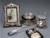 A modern silver coaster, a cased pair of silver napkin rings and other silver and plated items including a photograph frame.           