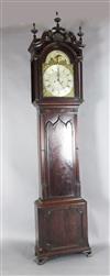 Major Scholfield of Manchester. An early 19th century flame mahogany cased eight day longcase clock, 8ft 6in.                          