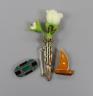 An Art Deco 925, black onyx, chrysoprase? and marcasite set octagonal brooch, 30mm, an amberoid yacht brooch and a gilt metal and paste set posy holder brooch.                                                             