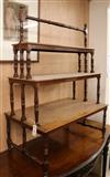 A Victorian style and double-sided waterfall bookcase W.84cm                                                                           