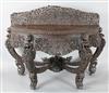 A 19th century Burmese carved hardwood console table, W.5ft 2in. D.2ft 2in. H.3ft 6in.                                                 