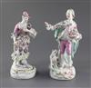 A pair of early Derby figures of a gentleman and his companion, c.1758, h. 25cm and 23.5cm                                             