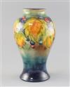 A Moorcroft 'leaf and berry' flambe baluster vase, 1930's, H.14.2cm                                                                    