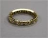 A yellow metal and diamond set full eternity ring, size Q.                                                                             