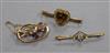 An Edwardian 15ct gold and gem set bar brooch and two 9ct gold and gem set bar brooches.                                               