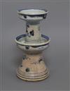 An 18th century Chinese blue and white candlestick height 22cm                                                                         