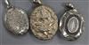 Two Victorian engraved silver lockets and an ornate Indian white metal locket, largest 50mm.                                           