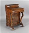 A Victorian figured walnut Davenport, W.1ft 9.5in. D.1ft 10in. H.3ft 1in.                                                              