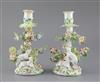 A pair of early Derby 'sheep' candlesticks, c.1758, H. 21cm                                                                            