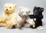 A Steiff Yellow tag Classix boxed Gold Bear, 34cmm with Steiff Yellow tag Grey, 34cm, box, also a Black Steiff Classic Yellow tag, box, 32cm                                                                                