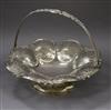 A Victorian engraved silver cake basket, Edward Ker Reid, London, 1857, 20 oz.                                                         