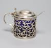 A George III pierced silver drum mustard, London, 1767, (a.f.) with blue glass liner                                                                                                                                        