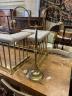 An early 20th century lacquered brass twin branch reading light with blue glass shades, height 86cm                                                                                                                         