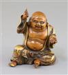 A Japanese wood and gilt lacquer figure of Hotei, Meiji period, H. 11.3cm, two toes lacking                                            