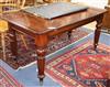 An early 19th century mahogany writing table with cross banded top W.144cm                                                             