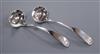 A pair of Scottish silver fiddle and shell pattern sauce ladles, William Forrest & Co, Edinburgh, 1822.                                