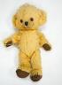 A Merrythought Cheeky registered design label, good condition, slight damage to one paw, 13in.                                                                                                                              