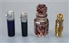 Two late Victorian silver mounted coloured glass scent bottles, a Czechoslovakian scent bottle and a Bohemian glass scent              