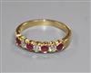 An 18ct yellow gold, ruby and diamond seven-stone ring, collet-set size P/Q.                                                           