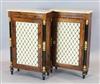 A pair of Regency style rosewood pier cabinets, W.1ft 9.5in. D. 9in. H.2ft 11in.                                                       