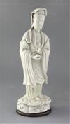 A large Chinese Dehua blanc de chine figure of Guanyin, Kangxi period, height 39cm, restored                                           