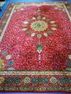 A Wilton Persian design red ground carpet 364 x 274cm                                                                                  