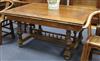 A 17th century style French design walnut extending dining table                                                                       