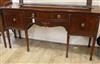 A George III style mahogany serpentine fronted sideboard W.182cm                                                                       