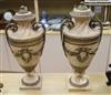 A pair of plaster urns height 57cm                                                                                                     