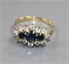 An 18ct gold, sapphire and diamond fifteen-stone cluster ring, claw set, size Q.                                                       