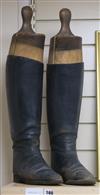 A pair of leather riding boots with stretchers                                                                                         