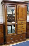 An Edwardian mahogany compactum wardrobe W.132cm                                                                                       