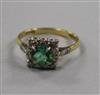 An early 20th century 18ct gold, green tourmaline and diamond square cluster ring, size M.                                             